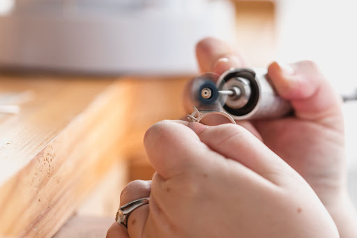 A LONITÉTM experienced craftsman is making a cremation diamond ring